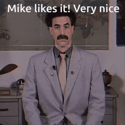 Man In Suit And Tie Saying Mike Likes It Very Nice GIF