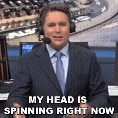 Man In Suit And Tie Saying My Head Is Spinning GIF
