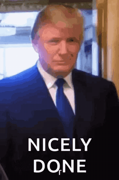 Man In Suit And Tie Saying Nicely Done GIF