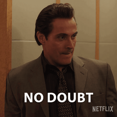 Man In Suit And Tie Saying No Doubt GIF