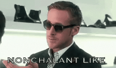 Man In Suit And Tie Saying Nonchalant Like With Sunglasses GIF