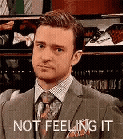 Man in Suit and Tie Saying Not Feeling It