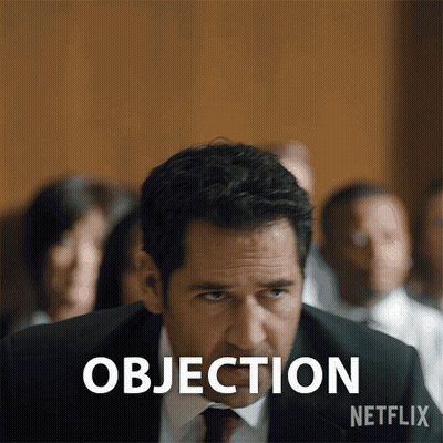Man In Suit And Tie Saying Objection GIF