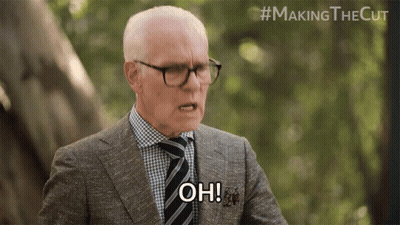 Man In Suit And Tie Saying Oh GIF