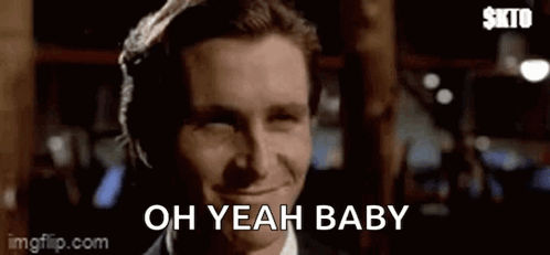 Man In Suit And Tie Saying Oh Yeah Baby GIF