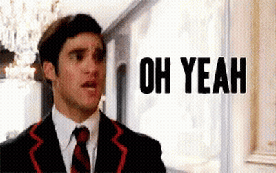 Man In Suit And Tie Saying Oh Yeah GIF