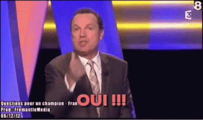 Man In Suit And Tie Saying Oui GIF