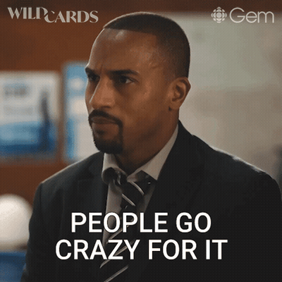 Man In Suit And Tie Saying People Go Crazy For It GIF