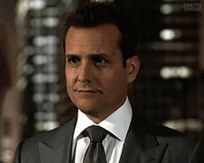 Man In Suit And Tie Saying Pretty Shows GIF