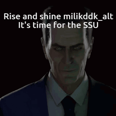 Man In Suit And Tie Saying Rise And Shine GIF