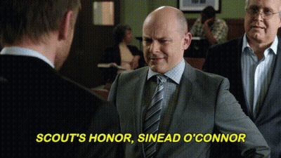 Man In Suit And Tie Saying Scout's Honor GIF