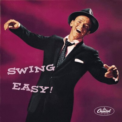 Man In Suit And Tie Saying Swing Easy GIF
