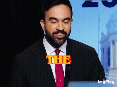 Man In Suit And Tie Saying The In Orange GIF