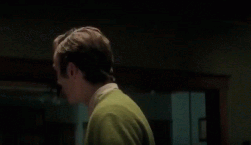 Man In Suit And Tie Saying We Are Back GIF