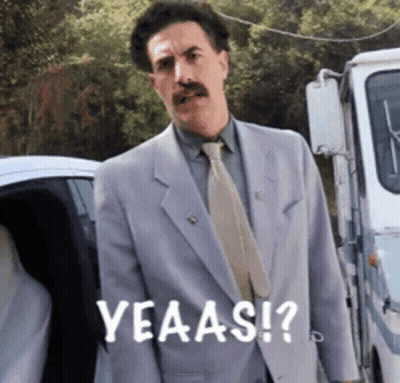 Man In Suit And Tie Saying Yeaas GIF