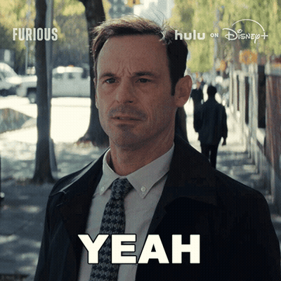 Man In Suit And Tie Saying Yeah GIF