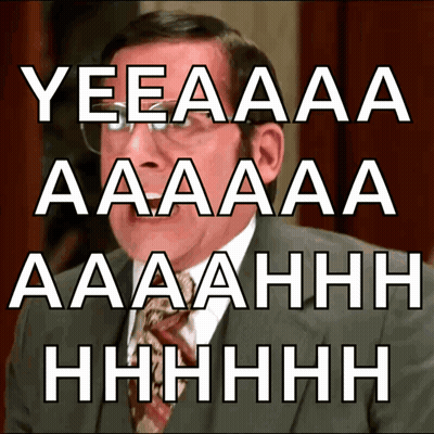 Man In Suit And Tie Saying Yeeaaa GIF
