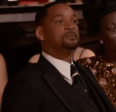 Man In Suit And Tie Saying Yes GIF