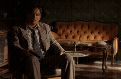 Man In Suit And Tie Saying Yet Here We Are GIF