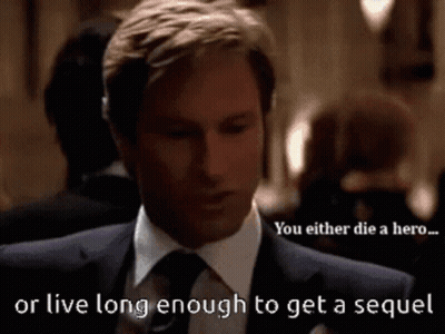 Man In Suit And Tie Saying You Either Die A Hero Or Live Long Enough To Get A Sequel GIF