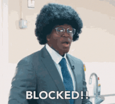 Man In Suit And Tie Says Blocked GIF