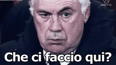 Man In Suit And Tie Says Che Ci Faccio Qui GIF