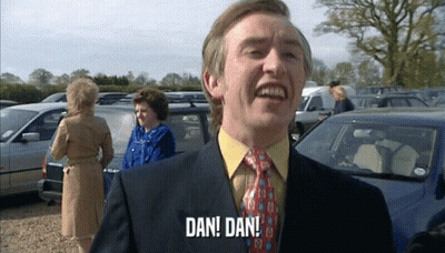 Man In Suit And Tie Says Dan Dan GIF