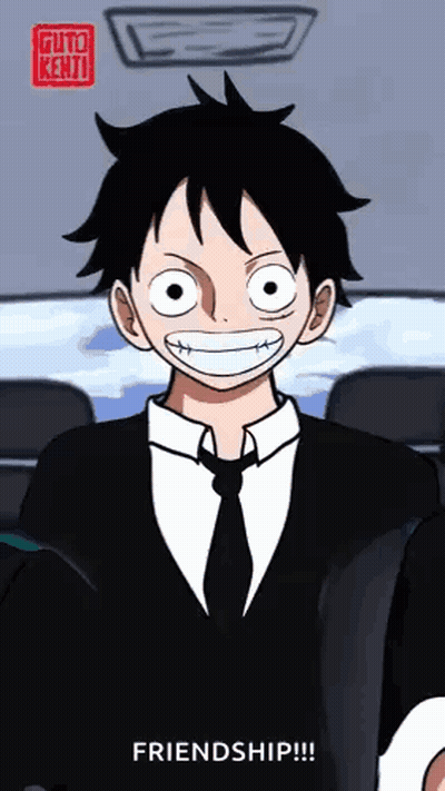 Man In Suit And Tie Says Friendship GIF