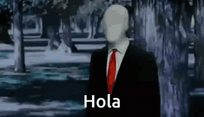 Man In Suit And Tie Says Hola GIF