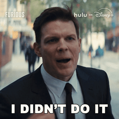 Man In Suit And Tie Says I Didn't Do It GIF