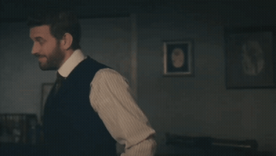 Man In Suit And Tie Says Little Bit Far Fetched GIF