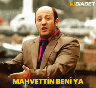 Man In Suit And Tie Says Mahvettin Beni Ya In Yellow Letters GIF