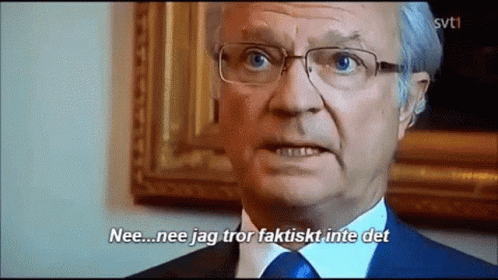 Man In Suit And Tie Says Nee GIF