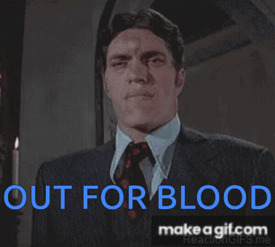 Man In Suit And Tie Says Out For Blood GIF