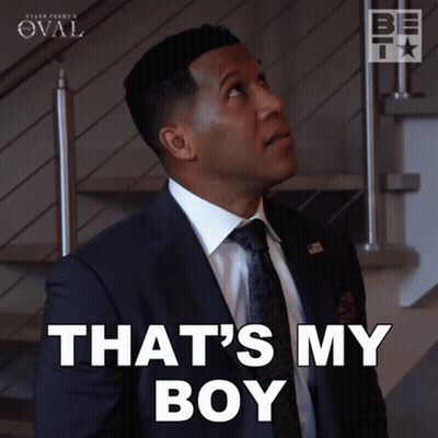 Man In Suit And Tie Says That's My Boy GIF