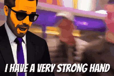 Man In Suit And Tie Says Very Strong Hand GIF