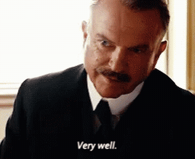 Man In Suit And Tie Says Very Well GIF