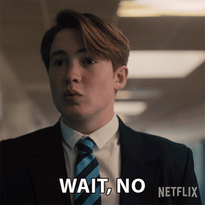 Man In Suit And Tie Says Wait No GIF