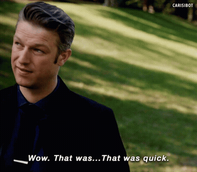 Man In Suit And Tie Says Wow GIF