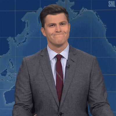 Man In Suit And Tie Says Yeah In Front Of SNL Map GIF
