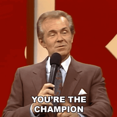 Man In Suit And Tie Says You're Champion GIF