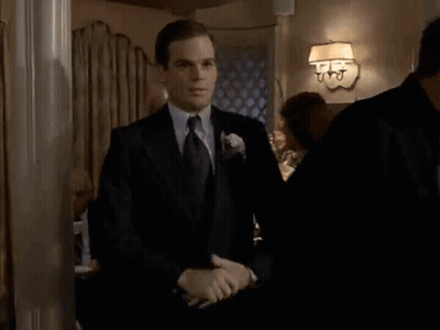 Man In Suit And Tie Screaming In Room GIF