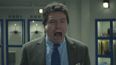 Man In Suit And Tie Screaming GIF