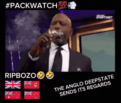 Man In Suit And Tie Singing Into Microphone And Smoking GIF