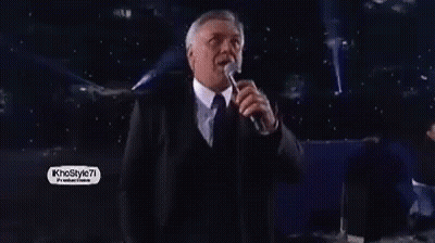 Man In Suit And Tie Singing Into Microphone Khostyle7 GIF