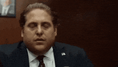 Man In Suit And Tie Singing GIF