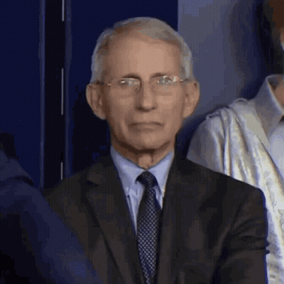 Man In Suit And Tie Sitting GIF