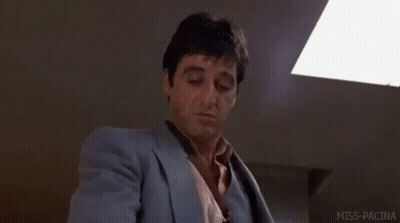 Man In Suit And Tie Sitting GIF