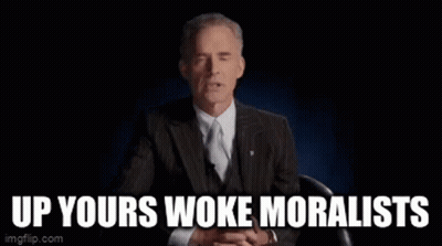 Man In Suit And Tie Sitting And Talking GIF