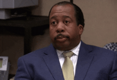 Man In Suit And Tie Sitting At Computer GIF